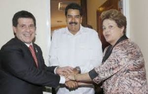 Dilma acting as peacemaker between Cartes and Venezuela's Maduro a few months ago in Surinam  