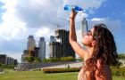 People try to cool themselves from the unbearable heat