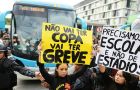 Protestors managed to hold up the team's convoy long enough to plant anti-World Cup stickers on their bus