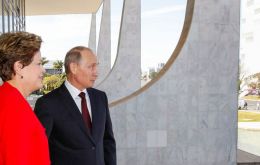 The Russian president was received with full head of state honors by Rousseff at Planalto Palace in Brasilia 