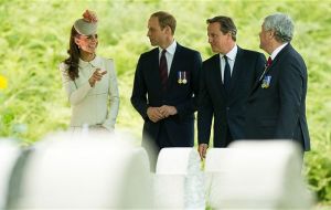 The Duke and Duchess of Cambridge, Prince Harry and David Cameron attended a twilight ceremony at St Symphorien Military Cemetery near Mons