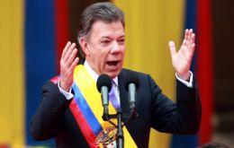 “Acts of peace, that's what the Colombian people ask for today,” Santos said after receiving the sash of office