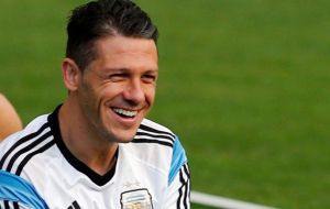'Dólar Demichelis', refers to the number on the Argentine soccer player jersey, 15, following on Mascherano's 14 and Leonel Messi's 10