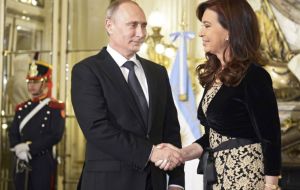 Cristina Fernandez hosts President Putin at Government House last July when met following the Russian leaders' tour of Latin America  
