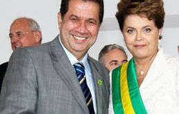The former minister and chairman of the Democratic Labor Party next to the Brazilian president when her inauguration     