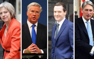 Theresa May will remain as interior minister; Philip Hammond as foreign secretary and Michael Fallon in defense