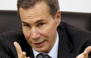 Nisman accused Cristina Fernandez and minister Timerman of trying to derail a lengthy investigation into the bombing of the AMIA Jewish center
