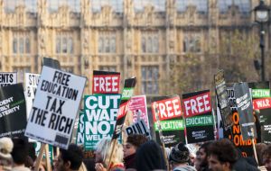 After the speech hundreds marched through London in protest, carrying banners like “free education” and “tax the rich”, and angrily confronting police.