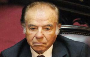 Former president Carlos Menem who should have been sitting in the dock was absent on medical prescription