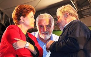 Lula da Silva, is reasserting his sway by placing a confidant, Jaques Wagner (C), as Ms. Rousseff’s chief of staff. 