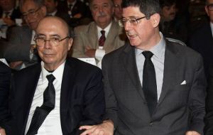 Meirelles and Finance Minister Joaquim Levy delivered speeches to business leaders in Brasilia after having lunch together