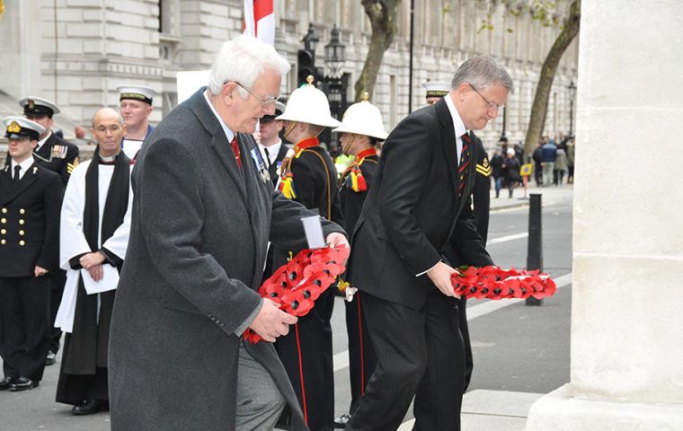 MLA Roger Edwards and Mr. Andrew Rosindell, MP laying their wreaths at the Cenotaph  (Pic P. Pepper)