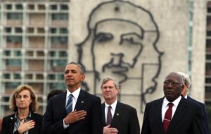Hand on his heart, Obama stood in Revolution Square as a band played the American national anthem, stunning sounds in a country as Cuba 
