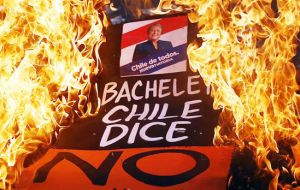 Protesters are demanding that President Michelle Bachelet speed up a long-awaited reform to guarantee universal access to free public education in Chile.