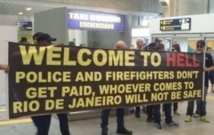 Passengers arriving recently at Rio’s international airport have been greeted by police holding up banners that read: “Welcome to Hell.”