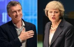 Macri and  Theresa May were seated at adjacent tables and talked for “only a minute, very much informal”