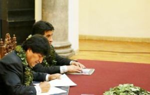 Morales signed a law which officially recognizes as legal 22,000 hectares of coca crops, raising the limit of 12,000 hectares fixed in the previous law. 
