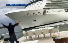 As the 16-deck, 122,000-ton Celebrity Equinox cruise ship loomed over the Todhunter’s back patio, the alarmed couple recorded video of the scene