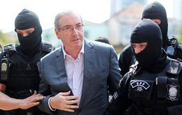 The former Lower House speaker’s defense team said they would appeal the decision but Cunha will remain imprisoned pending appeal.