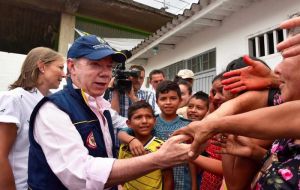 Colombian President Juan Manuel Santos flew to Mocoa, population 345,000, to oversee rescue efforts on the city outskirts and speak with affected families.