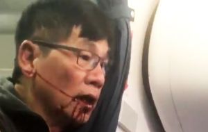 The 69-year-old physician had refused to leave, saying he needed to go home to see his patients. He was then dragged down the aisle of the aircraft. 