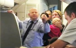  According to the video posted the flight attendant forcefully took the stroller from the woman, hitting her with it and just missing her child.