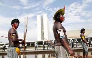 Demonstrators carried coffins representing indigenous dead in the takeover of their ancestral lands across Brazil and some tried to break into the Congress building.