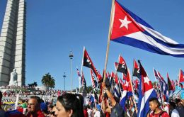  May 1 rally brings hundreds of thousands of Cubans to Havana's Revolution Square in a sea of red, white and blue flags and portraits of Fidel Castro. 