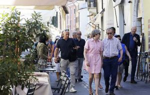 Mrs. May and her husband Philip photographed enjoying their holiday in Desenzano del Garda