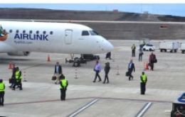 St Helena and South African flags to receive passengers and special guests in the first commercial flight at St Helena airport 