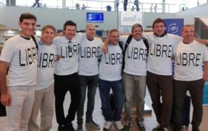 The group posed for a photo minutes before boarding their flight according to La Nacion. All of them were sporting “Libre” shirts, the Spanish word for free.