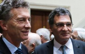 The order was signed by President Mauricio Macri and presented by Argentina’s Human Rights Secretary Claudio Avruj (L)