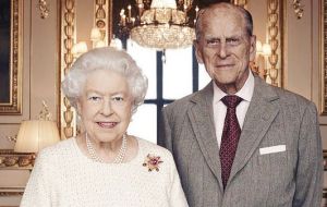 The monarch presented Philip with the honor at Windsor Castle, where they are marking their anniversary privately.