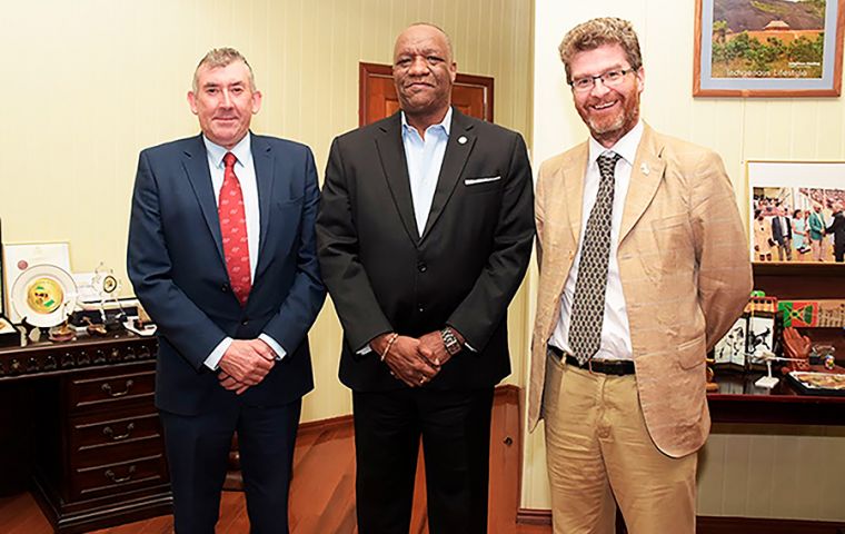 MLA Hansen, left, with Minister of State Joseph Harmon, center, and British High Commissioner to Guyana, Mr. Gregory Quinn.
