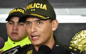 Barranquilla police commander Mariano Botero said the bomb detonated when officers gathered for morning formation; 49 officers were at the site