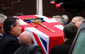 Capt Jolly's coffin was dressed with the Union Jack, his medals, a sword and green beret. Comrade, Capt Erich Bootland, described him as “larger than life”.(Pic RN/Mod/PA)