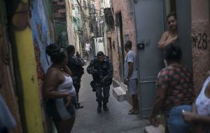 Army patrols were already used in Rio’s gang-ruled favelas, but a decree signed on Friday by Temer now gives the military overall control of security operations in Rio