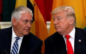 Trump told reporters he disagreed with Tillerson on some issues and feels he “will be much happier now.”