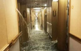 One of the corridors of Deck 9 flooded when the fire suppression system poured gallons of water