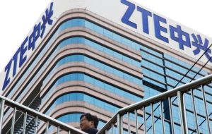 Washington neared a deal to lift its ban on U.S. firms supplying Chinese telecoms gear maker ZTE Corp, and Beijing announced tariff cuts on car imports
