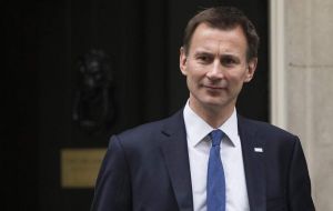 Jeremy Hunt, who has replaced Mr. Johnson as foreign secretary, said he would be “four square” behind her.
