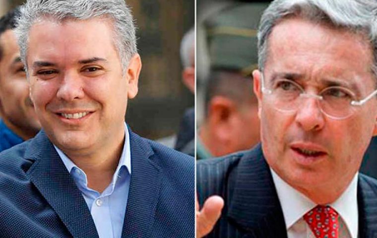 Uribe, 66,(R) is a mentor of incoming President Ivan Duque (L), who won the June 17 election as the candidate for Uribe’s right-wing Democratic Center party. 