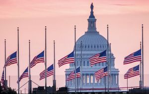 Flags at the US Capitol and other Washington landmarks remained at half-staff earlier on Monday