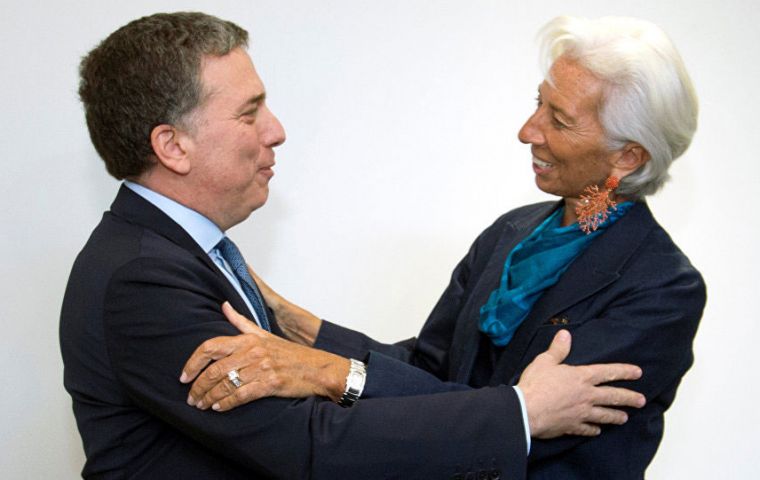 The photo all Argentina was expecting: IMF Managing director Christine Lagarde greets Argentina's Finance minister Nicolas Duvjovne before talks started 