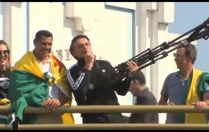 Bolsonaro, whose trademark pose at rallies is a “guns up” gesture, says he would encourage police to kill suspected drug gang members and other armed criminals