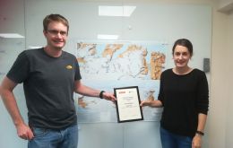 Nathan Fenney and Laura Gerrish with ‘Stanfords Award’ for the South Georgia and Shackleton Crossing Map.