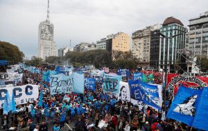 Thousands of public school teachers and university professors marched against Macri's fiscal belt tightening plans in capital Buenos Aires on Thursday