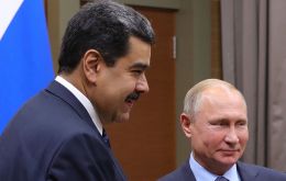 Putin helps Maduro in return for what?