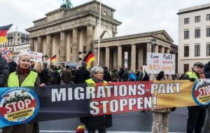 The migration pact addresses issues such as how to protect people who migrate, integrate them into new countries or return them to their home countries.