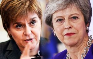 The row mirrors the divide between the two leaders over Brexit, with Ms Sturgeon urging Mrs. May to consider a fresh referendum on EU membership